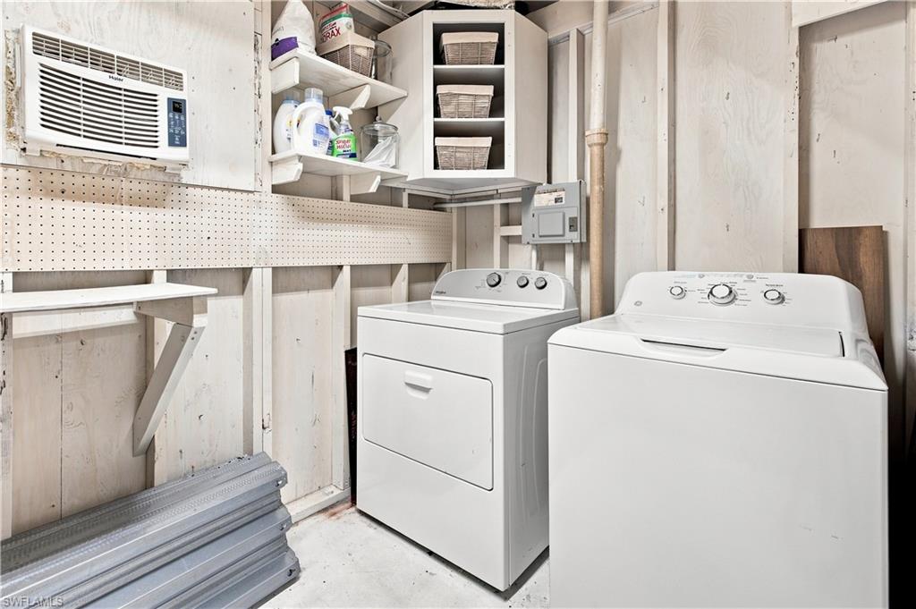 Corner shelving unit, wall-mounted shelving, pegboard storage, and window-mounted air conditioning unit