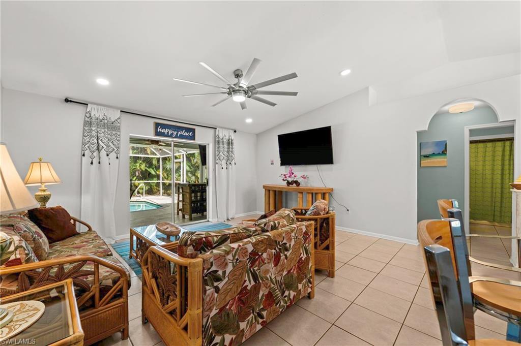 Living room with access to the pool