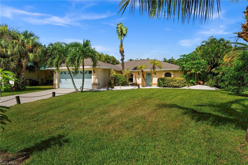 Mature landscaping and a welcoming front