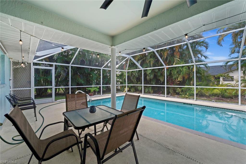 Relax in the lanai overlooking the pool