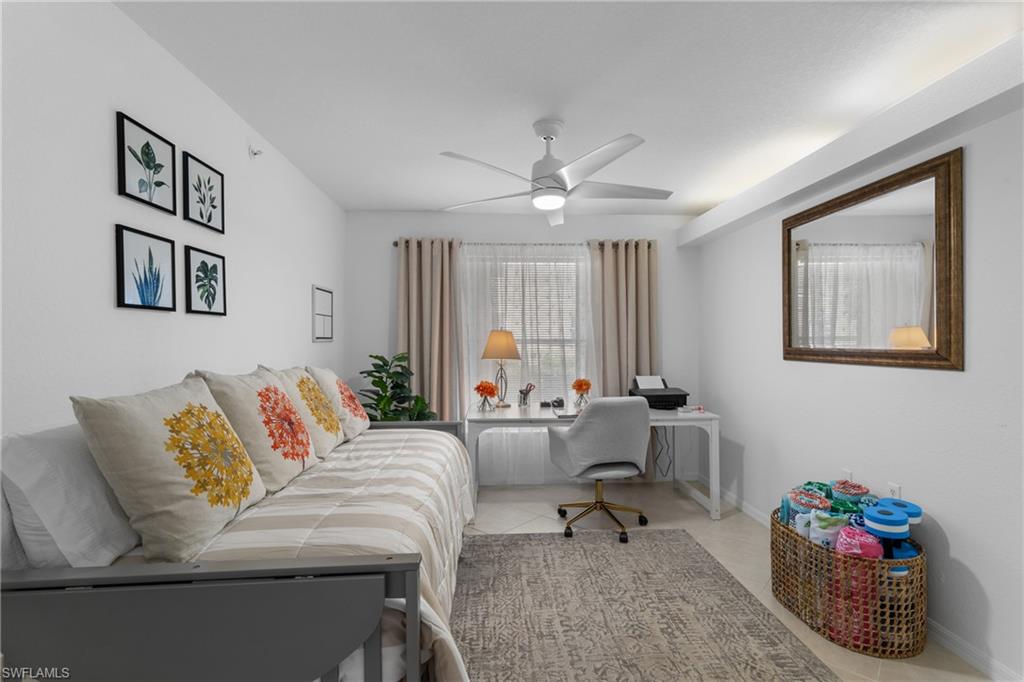 Den with day bed and desk