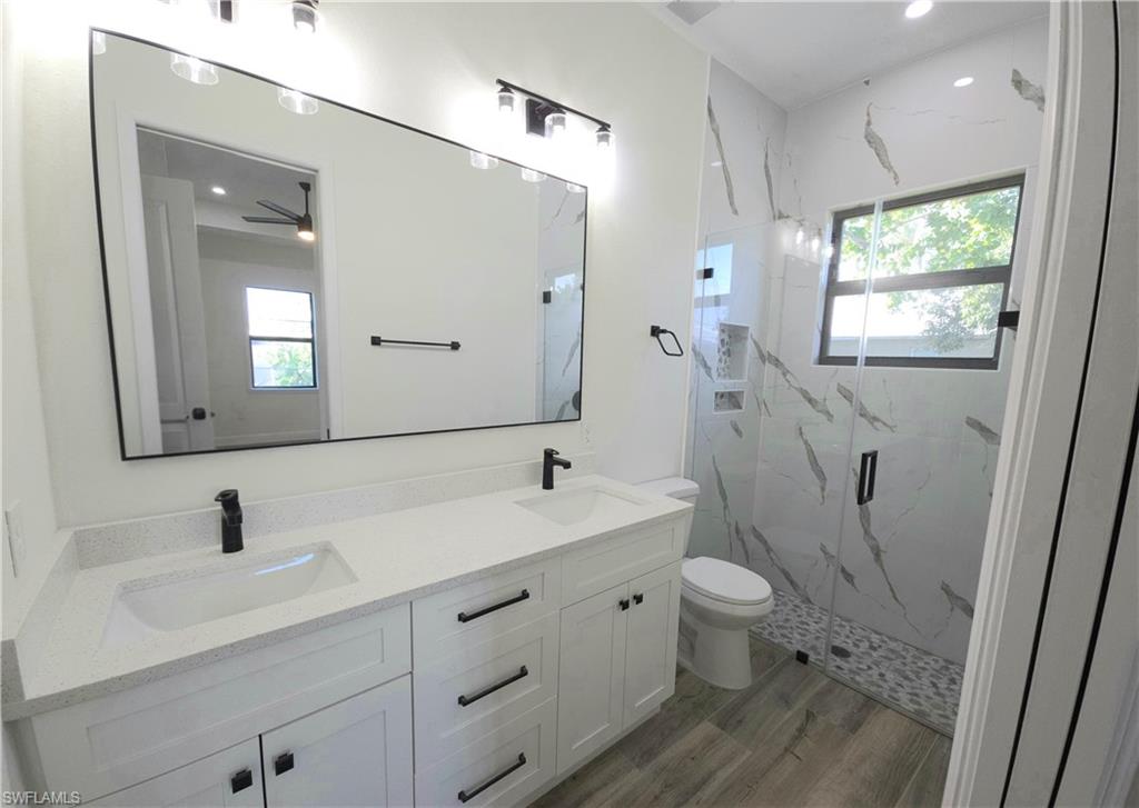 Dual vanity with integrated sinks and quartz countertops