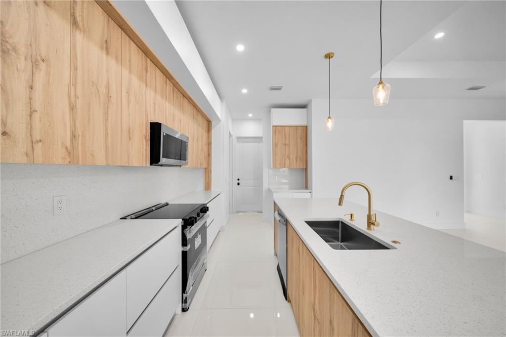 View from kitchen towards interior garage door