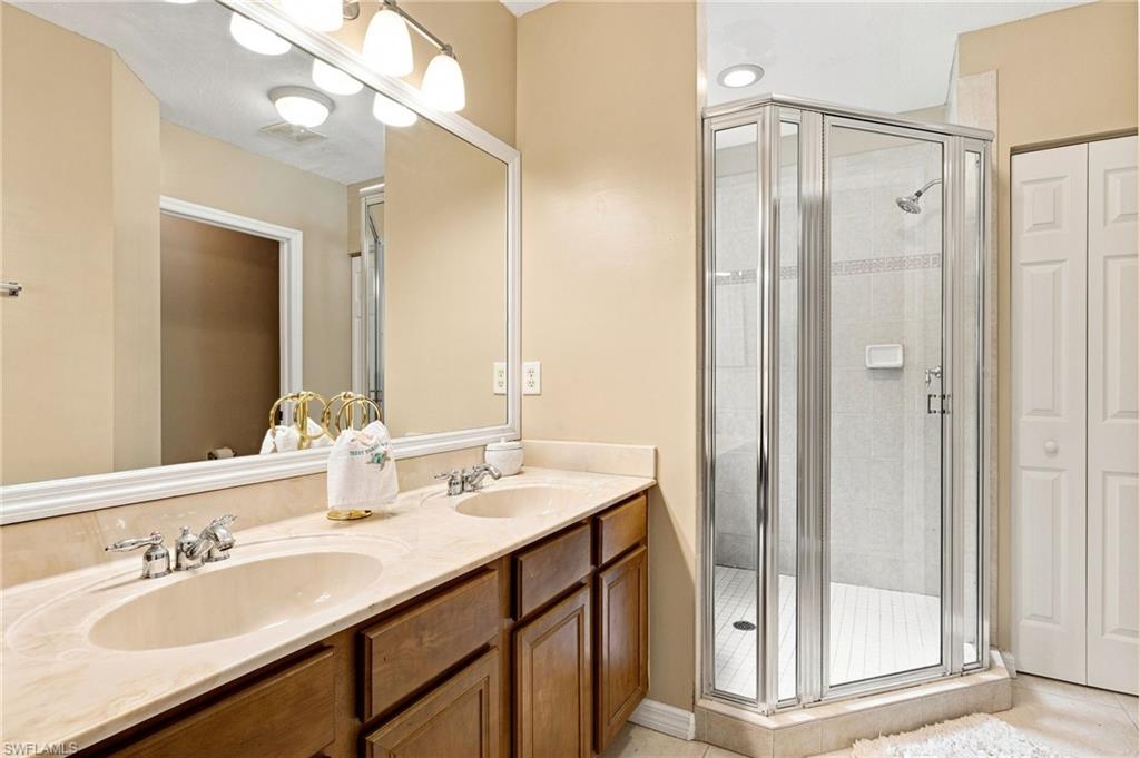 Dual vanity with integrated sinks and stone-finish countertop
