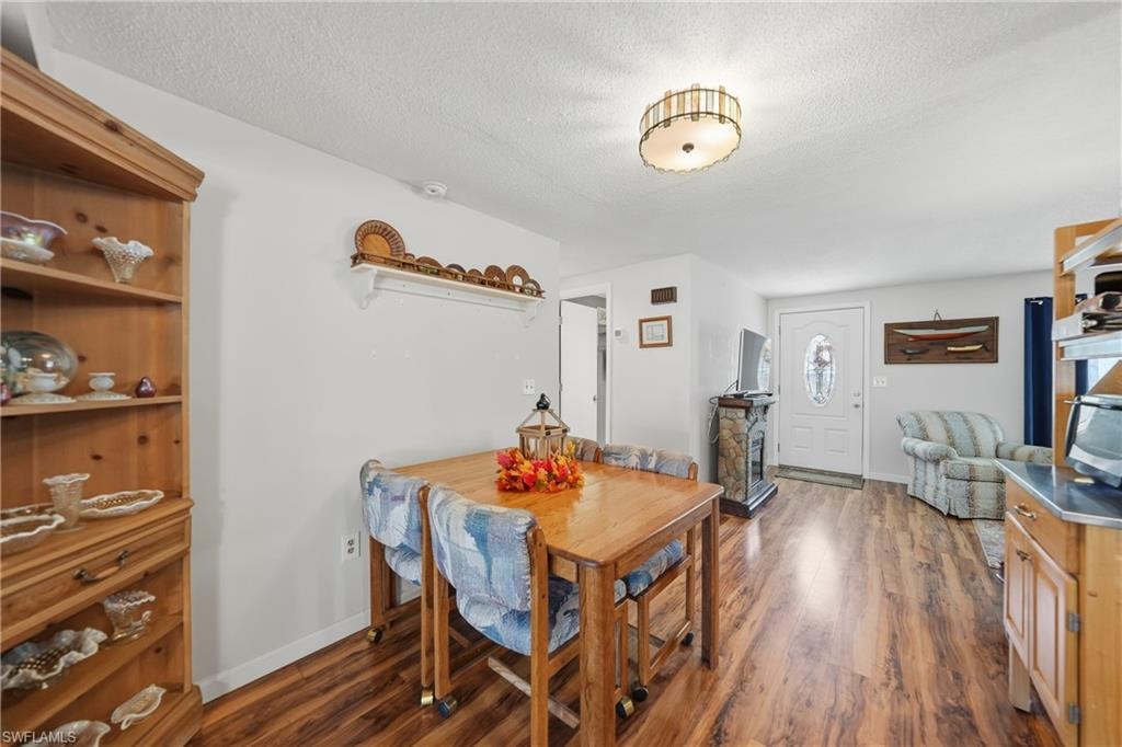Wood-finish laminate flooring throughout