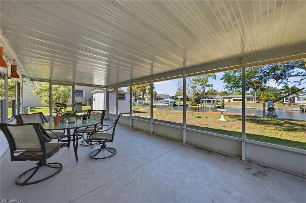 Screened patio with a concrete floor.