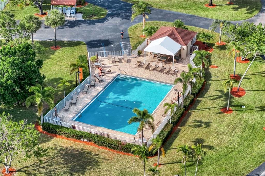 Pool featuring a patio area and fence
