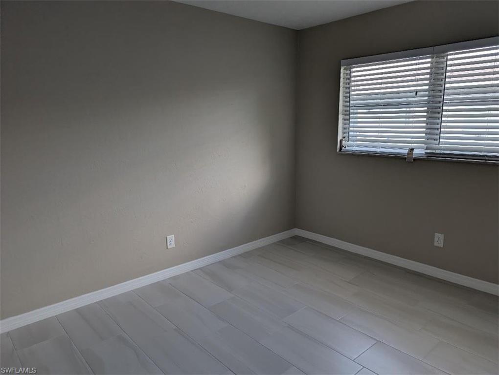 Empty room with baseboards