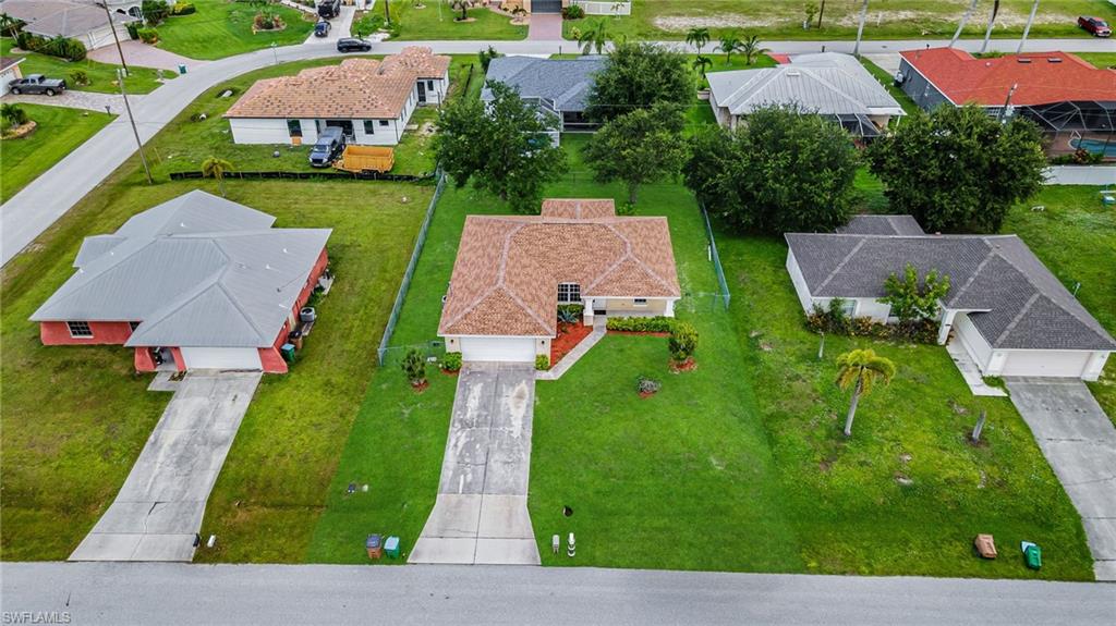 Single-story residence with a gabled roof and attached garage