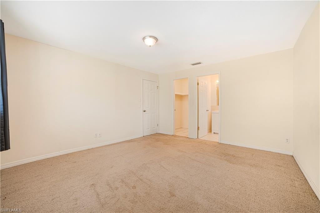 View of carpeted spare room