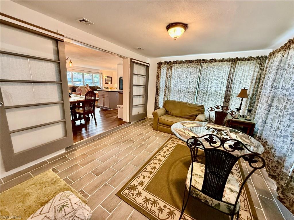 Sliding French Doors to the den.