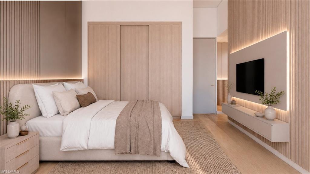 (Rendered photo) Wood-finish flooring, accent wall with vertical paneling, integrated backlighting, sliding closet doors, and a built-in media console