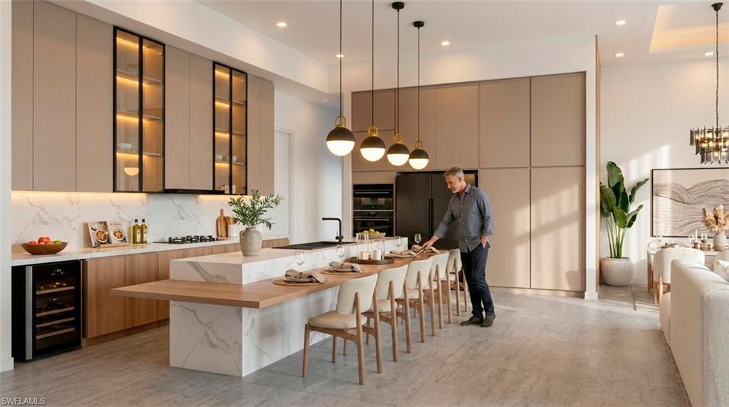 (Rendered photo) Open-concept kitchen with a large island featuring a waterfall countertop, integrated breakfast bar, and pendant lighting