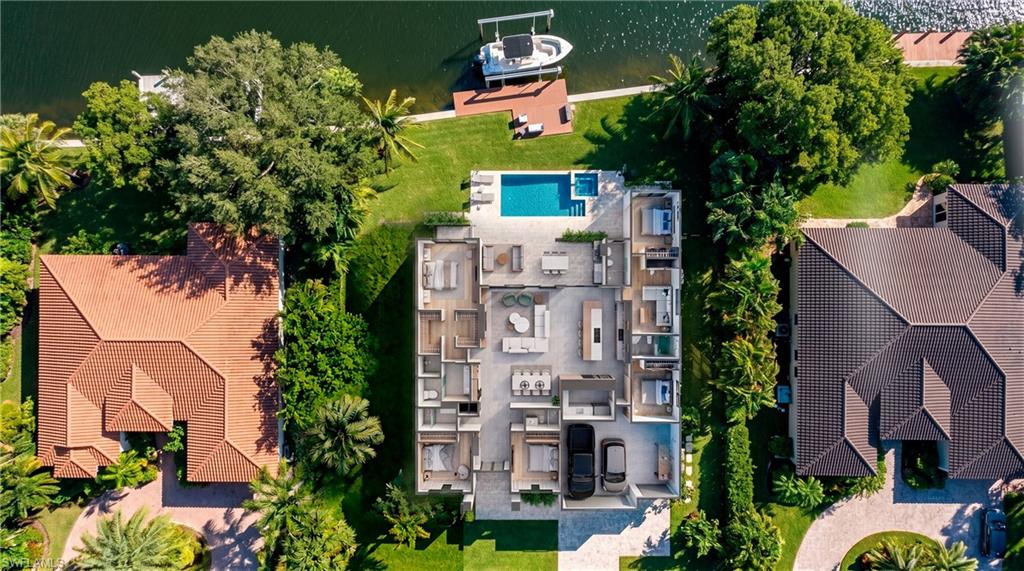 (Rendered photo) Waterfront property featuring a private boat dock, adjacent swimming pool, and large green space