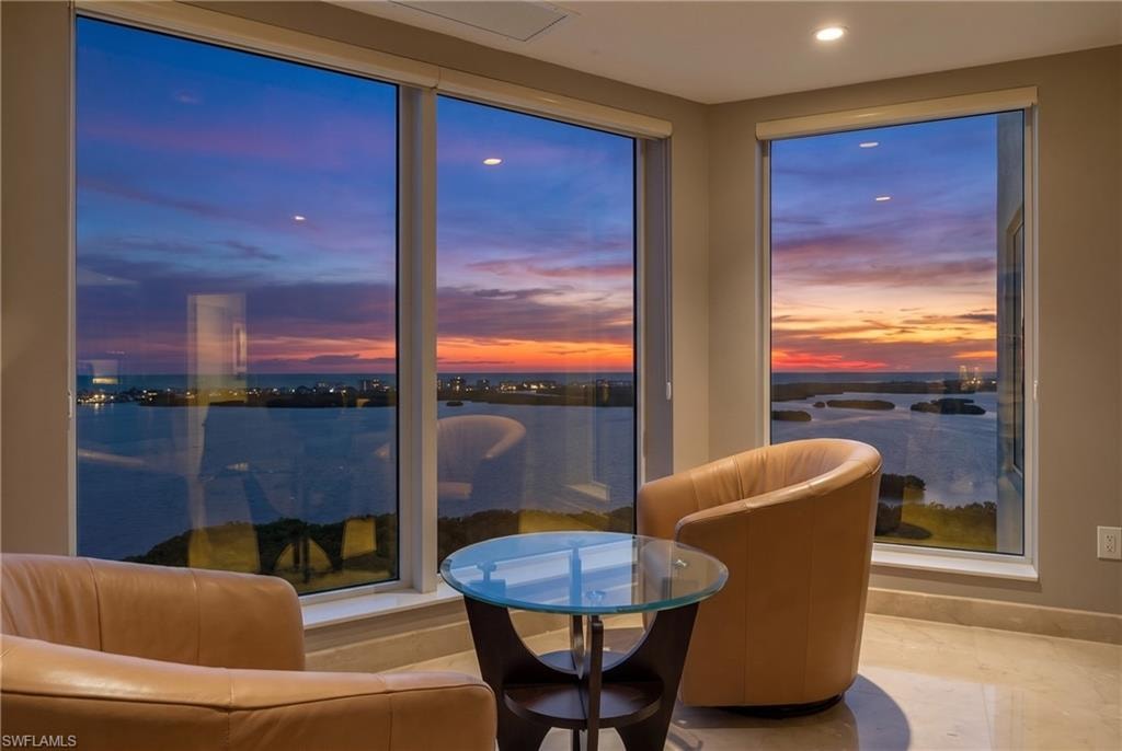 Expansive windows offering water scenery