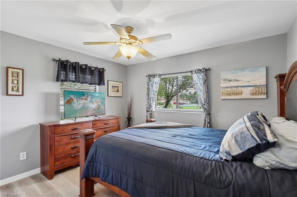 Wood-finish flooring with light gray walls