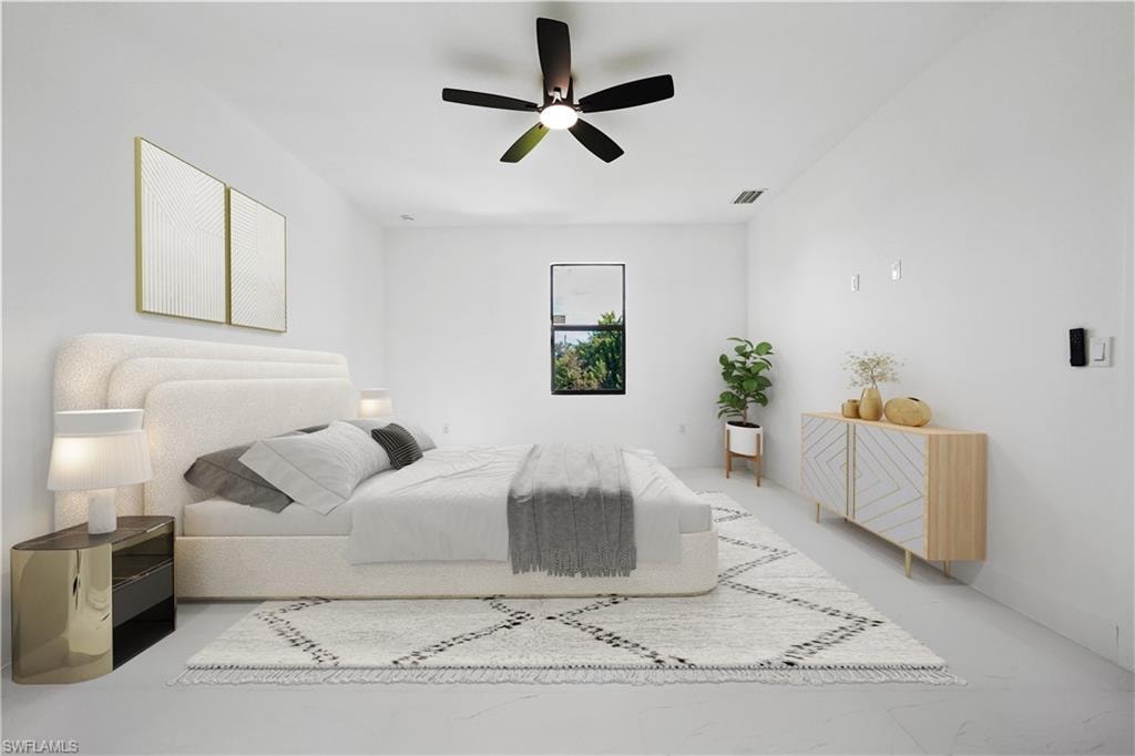 Bright interior with a black ceiling fan, recessed lighting, and a window with a dark frame