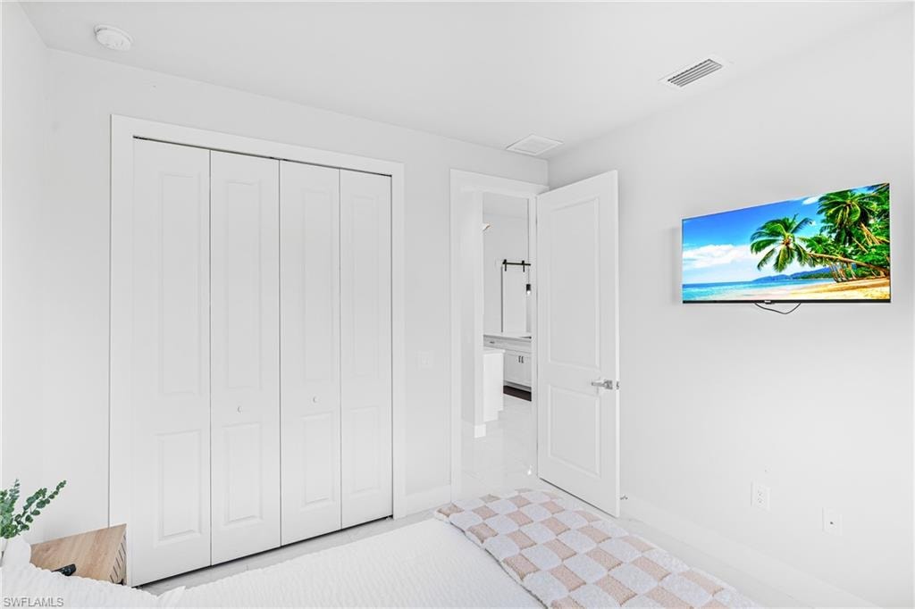 White bi-fold closet doors and white interior door