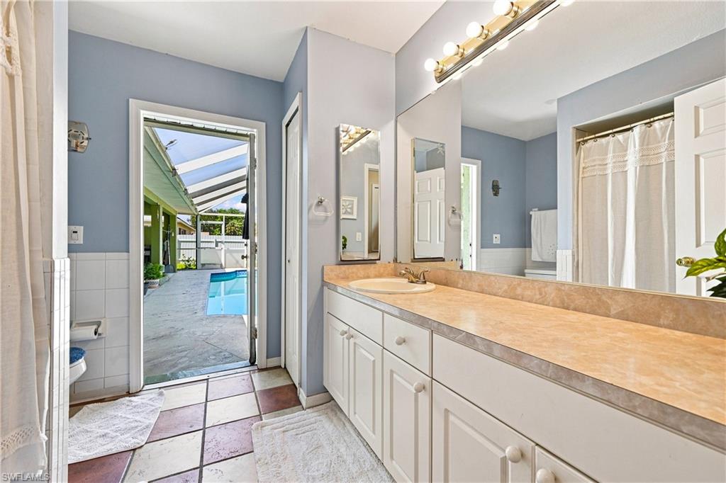 Bathroom vanity with dual sinks and ample storage