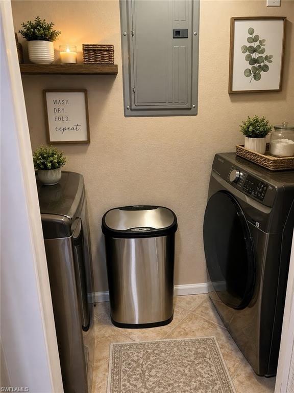 Laundry area with tiled flooring and a floating wood shelf