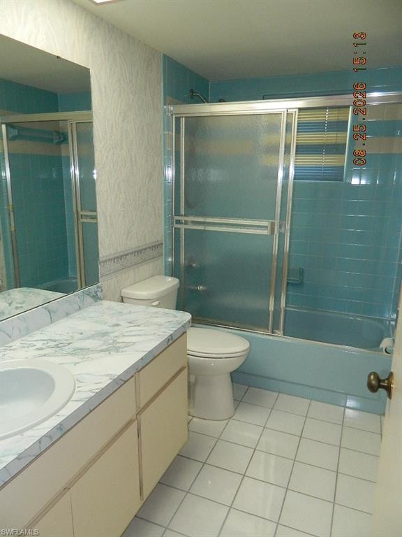 Vanity with a white basin and a light-toned countertop