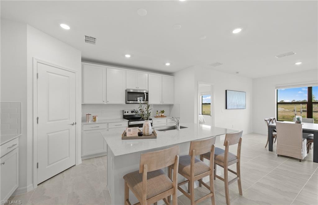 Photos are of similar Chapman home. Homes may vary.