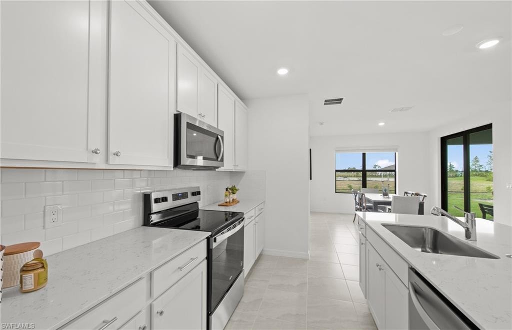 Photos are of similar Chapman floorplan. Homes may vary.