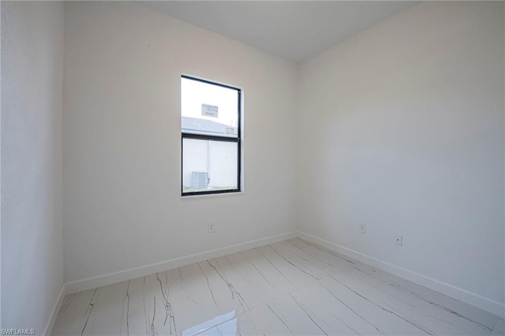 Empty room with baseboards