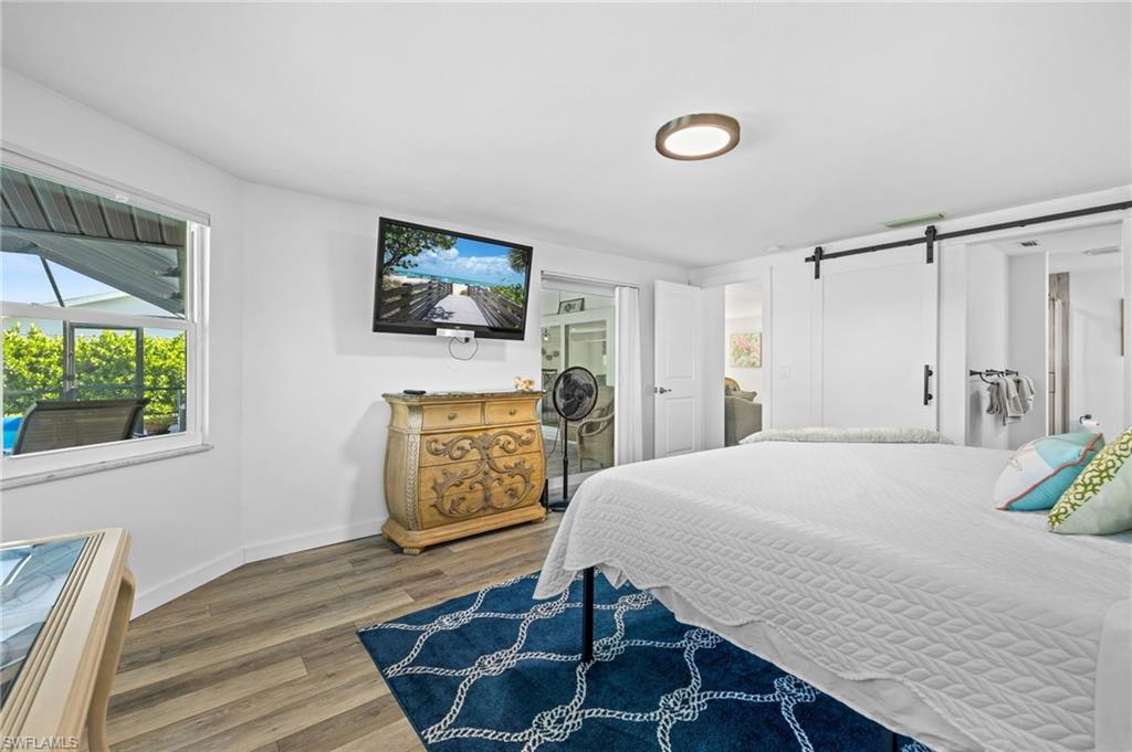 Wood-finish flooring with a white wall finish