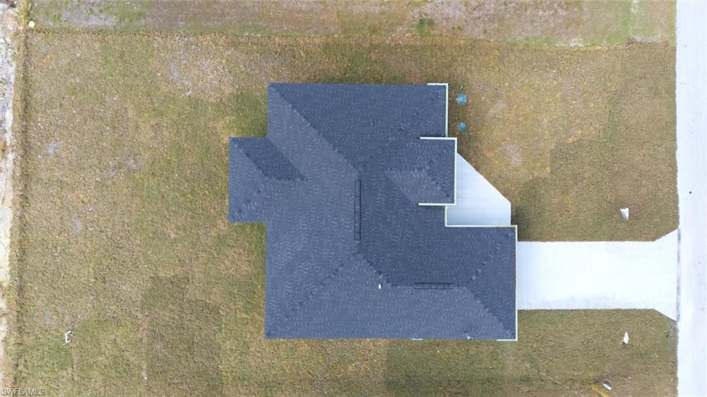 Pitched roof with dark shingles