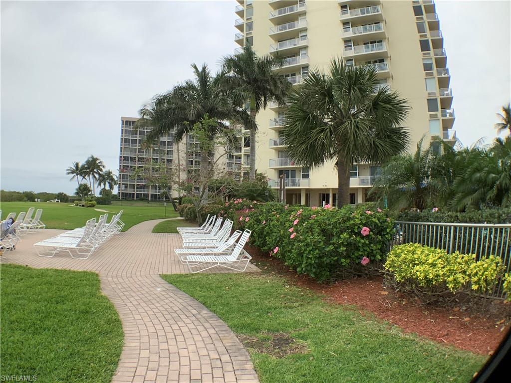 Sun deck with view of beach, showers out door