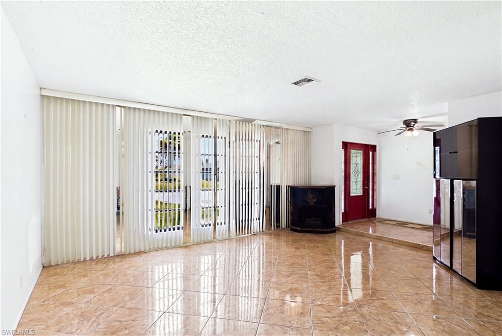 The heart of the home! A generous living space offering plenty of room to gather, relax, and entertain.