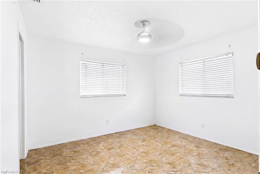 Spacious guest bedroom offering flexibility for family, visitors, or a home office.