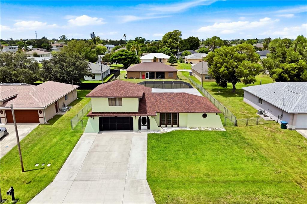 PRICED TO SELL! Spacious 4-bedroom, 3-bath Cape Coral home offering location, space, and outstanding potential.