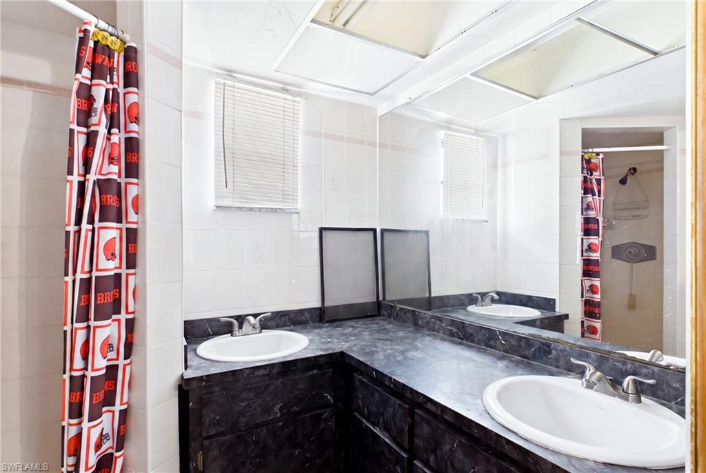 Thoughtfully designed guest bath providing an additional touch of comfort for family and friends.