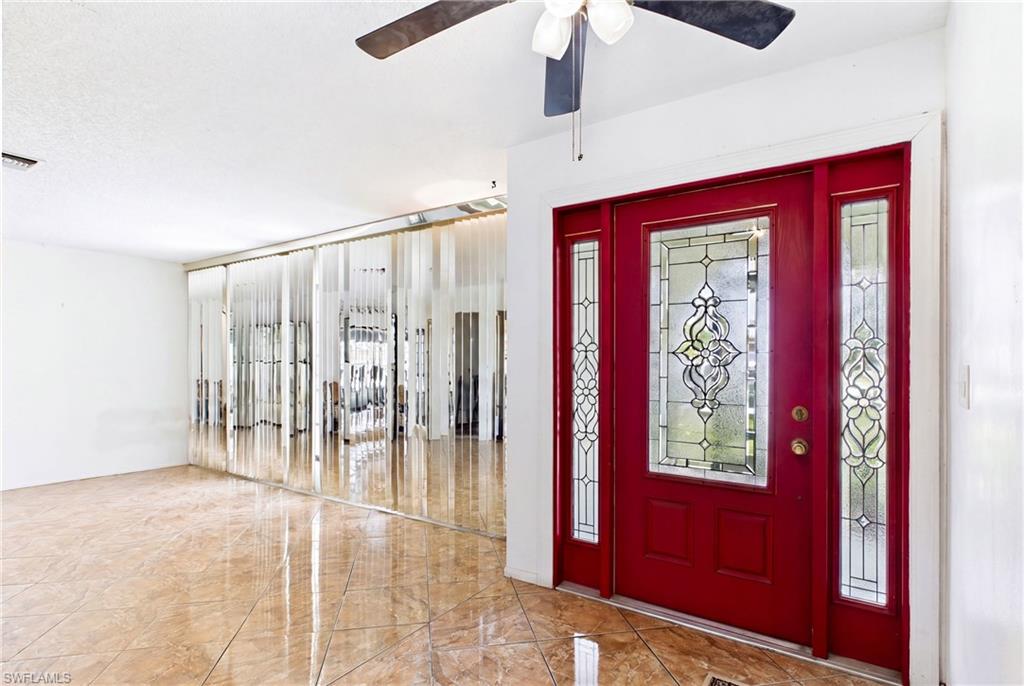 Inviting entryway welcomes you into this spacious Cape Coral home.