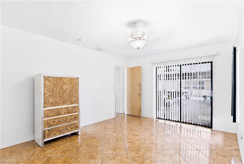Comfort meets tranquility in this spacious primary bedroom—your own personal escape within the home.