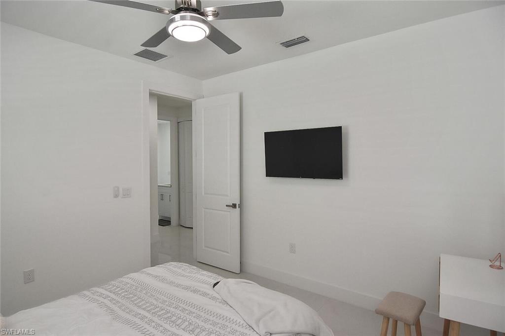 Bedroom featuring a ceiling fan