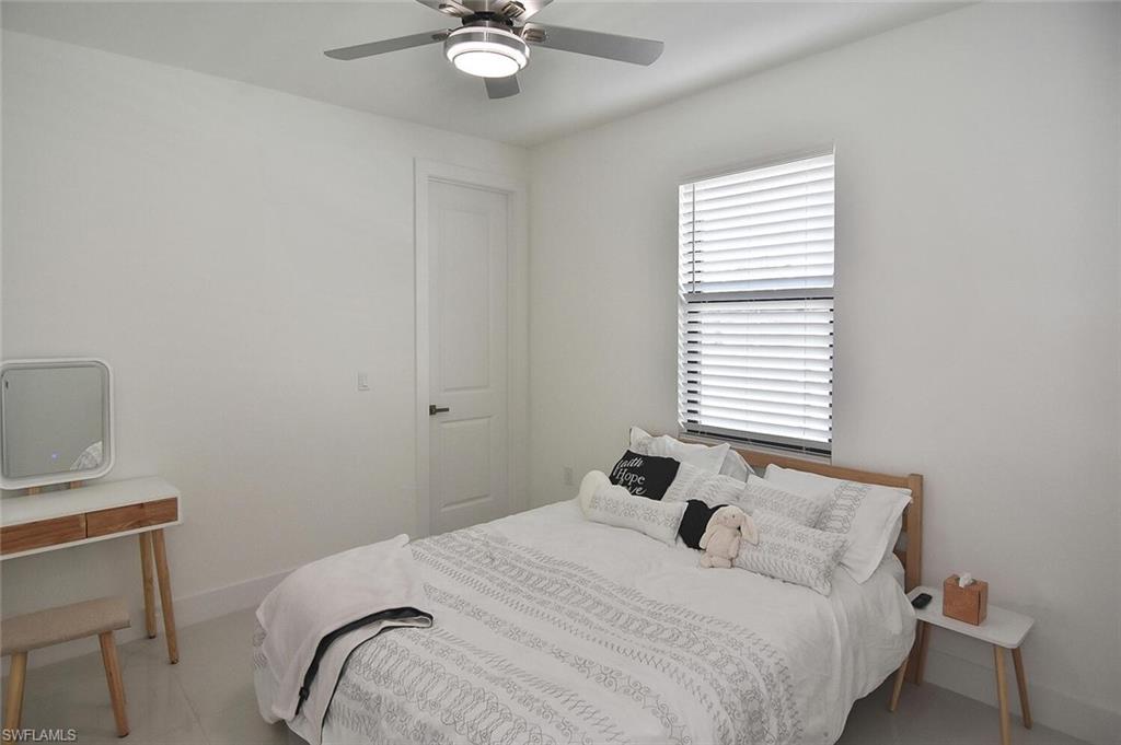 Bedroom featuring a ceiling fan