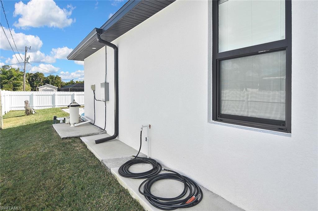View of property exterior with stucco siding