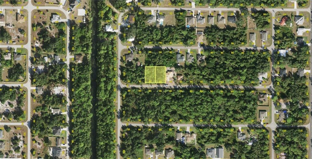 Aerial Map. Illustrating the property's location and surrounding parcels within the residential area